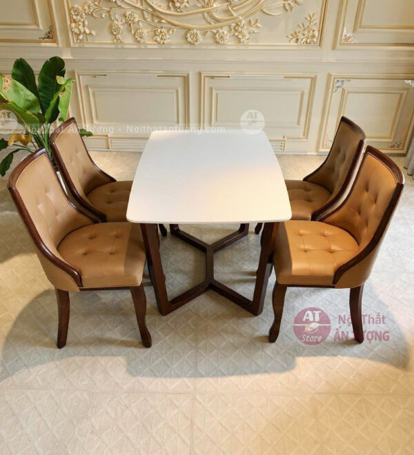 Bàn ăn 4 ghế mặt đá ghế gỗ nệm